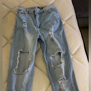 Fashion Nova light blue ripped jeans